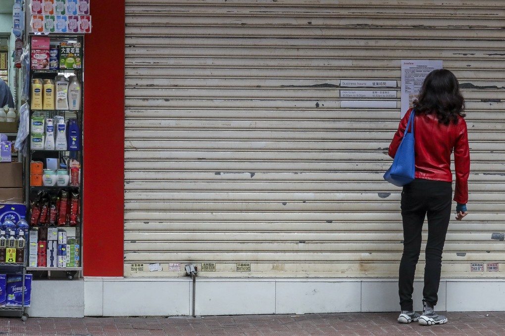 A shuttered shop is seen in Causeway Bay, Hong Kong, following the outbreak of the coronavirus. Photo: Nora Tam
