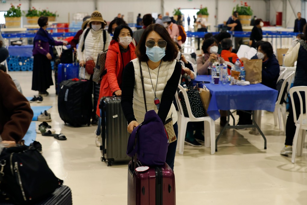 South Korean tourists pictured at an airport leaving Israel on Monday. Photo: AFP