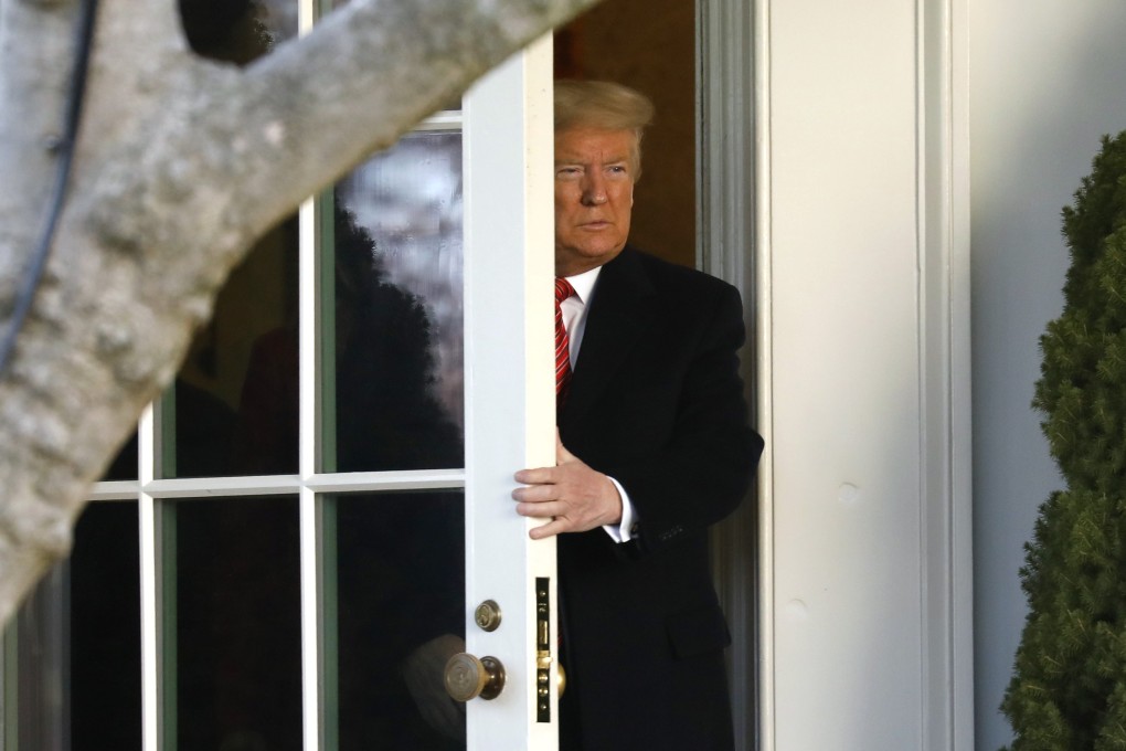 US President Donald Trump walks out of the Oval Office of the White House before his departure to Palm Beach, Florida, on February 14. Photo: TNS