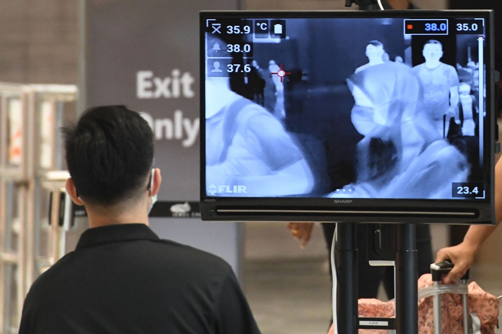 A temperature screening check at Singapore’s Changi Airport is seen on Thursday. Photo: AFP