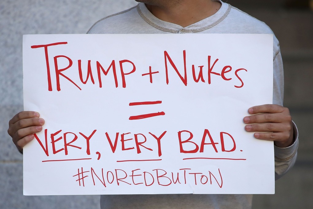 A protester during an anti-nuclear weapon rally outside the Trump International Hotel in Washington, DC. File photo: AFP