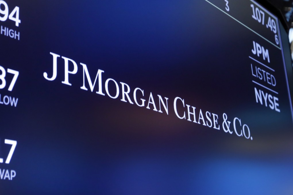 JPMorgan Chase’s logo appears above a trading post on the floor of the New York Stock Exchange. Photo: AP Photo