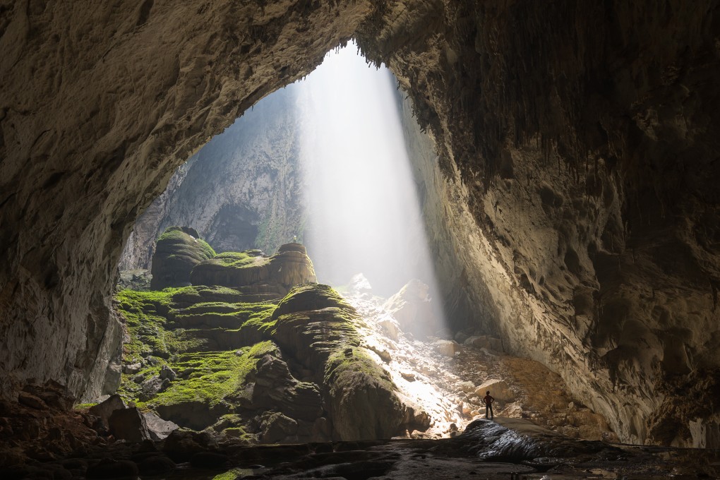 Sunlight streams down from a doline in a section of a cave in the Phong Nha mountains in Vietnam. Phong Nha is just one of Vietnam’s lesser known destinations that are worth visiting. Photo: Getty Images