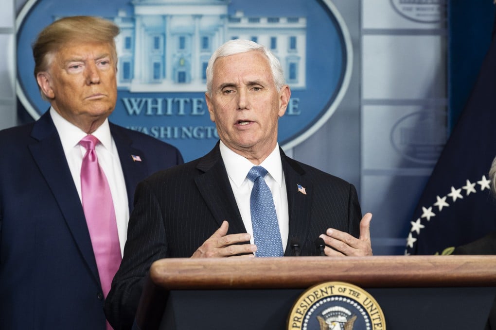 US Vice-President Mike Pence (right) speaks alongside US President Donald Trump during a press conference about the coronavirus at the White House on Wednesday. Photo: dpa