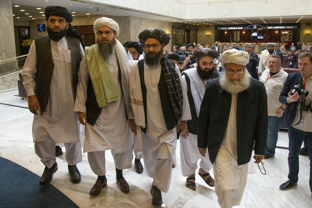 Members of the Taliban delegation arrive for peace talks in Moscow in October 2019 which led to a peace accord with the United States. Photo: AP