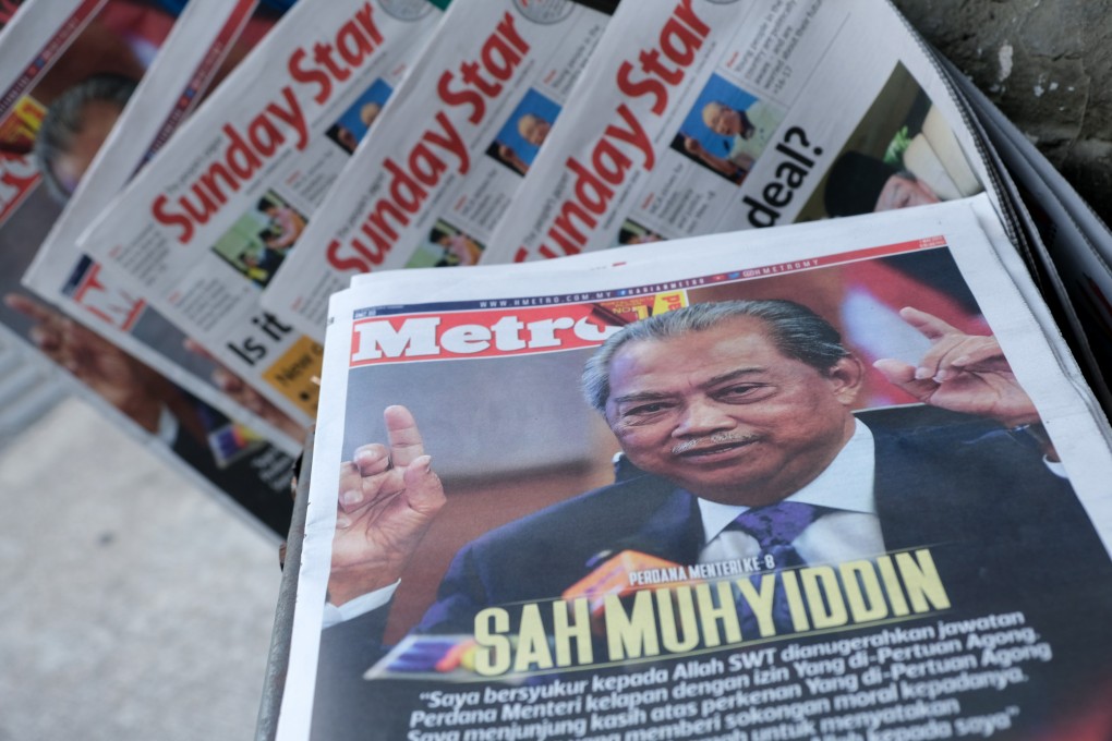 Malaysian prime minister-designate Muhyiddin Yassin features on the cover of a newspaper displayed at a stand in Kuala Lumpur on March 1. Muhyiddin, 72, was named prime minister the previous day by the country’s monarch to end a six-day tussle for power, after Mahathir Mohamad suddenly resigned. Photo: Bloomberg