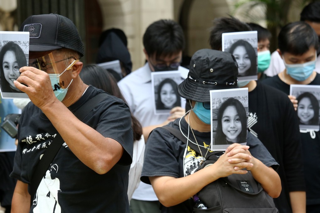 Anti-government protestors hold up images of 15-year-old Chan Yin-lam, who was found dead in September 2019 during a flash mob lunchtime march in Central. Photo: Jonathan Wong