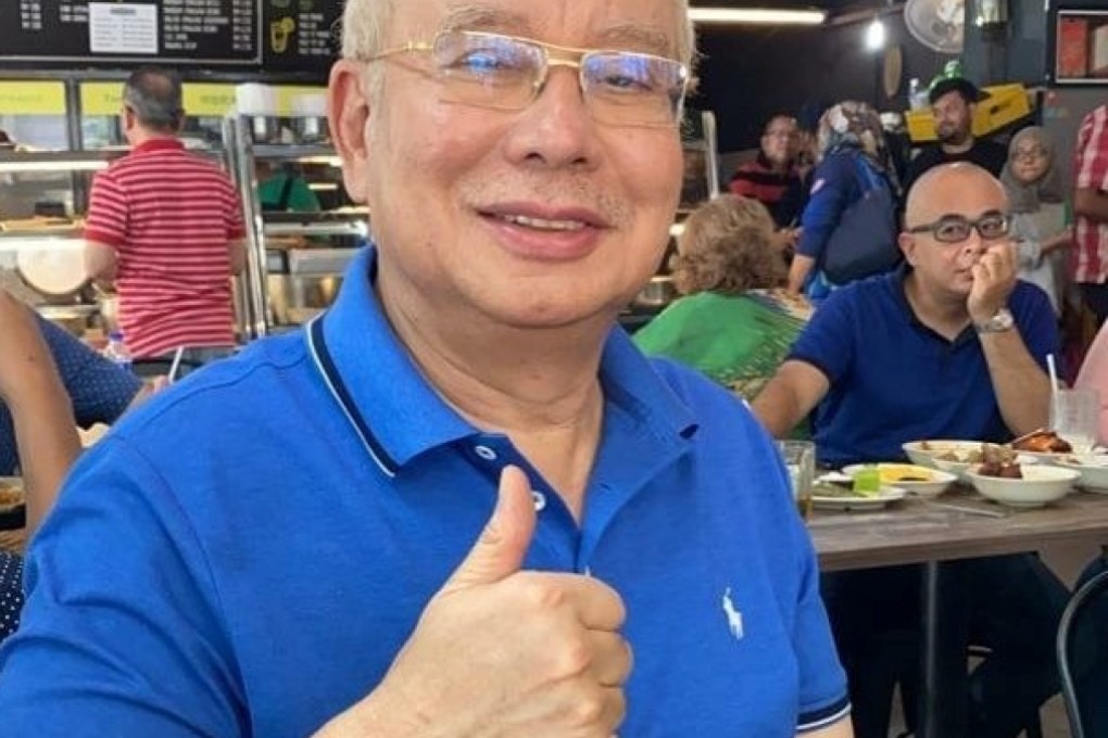 Former Malaysian prime minister Najib Razak posted this thumbs-up picture that was tagged as a gesture of satisfaction with a restaurant meal, but many Malaysians saw it as a bigger sign of happiness that the return of his party would affect the handling of high-profile corruption trials. Photo: Facebook via Reuters