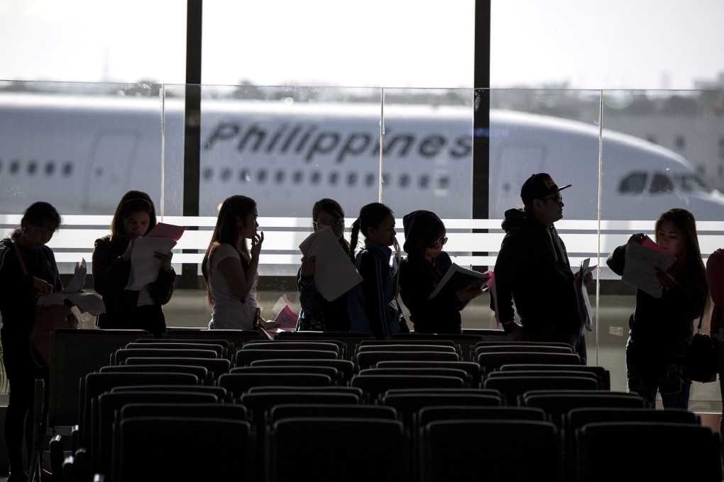 Under Philippine law, no travellers are allowed to take more than US$10,000 in cash in or out the country. File photo: AFP