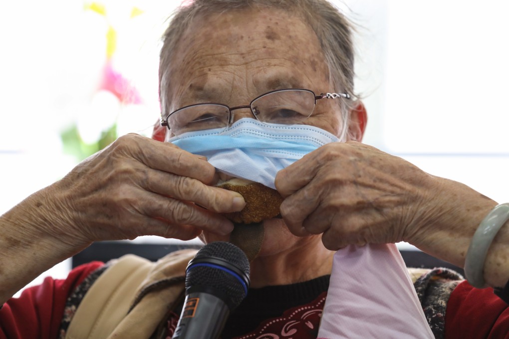 Lau Choi-yu uses fruit peel to stop the inside of her mask getting wet so she can use it for longer. Photo: Nora Tam