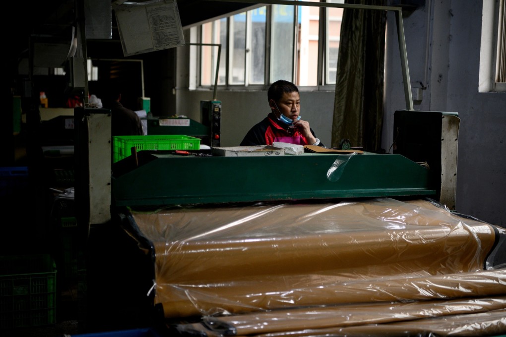 China's central bank held a teleconference on Tuesday with delegates from the China Insurance and Banking Regulatory Commission, the Ministry of Finance and all major lenders, discussing how to offer financial support to the economy. Photo: AFP