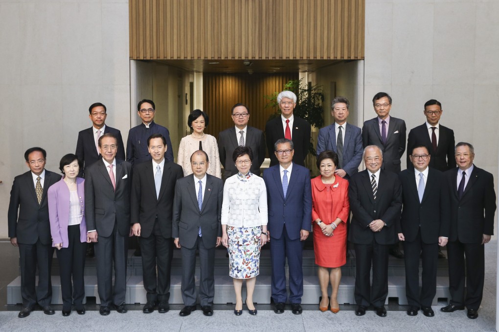 Newly elected Chief Executive Carrie Lam Cheng Yuet-ngor (centre) and the members of her government’s Executive Council pose for a photo before their meeting at the government offices in Tamar, Admiralty, on July 4, 2017. Photo: Sam Tsang