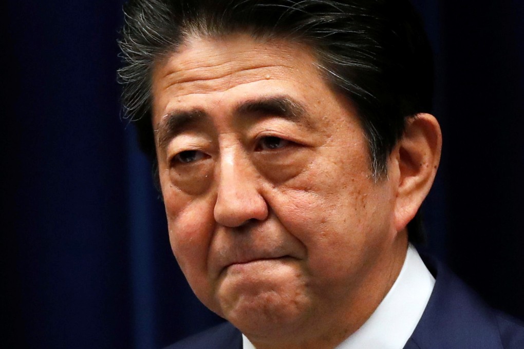 Japan's Prime Minister Shinzo Abe attends a news conference on the coronavirus. An analyst said the cancellation of the Olympic Games would not only be a financial blow, but would also dent the political pride of his government, which wanted to show the world that Japan could host a successful Olympics. Photo: Reuters