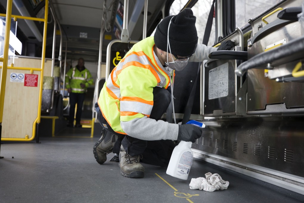 A worker cleans a bus in Seattle, Washington, on Tuesday. Photo: AFP