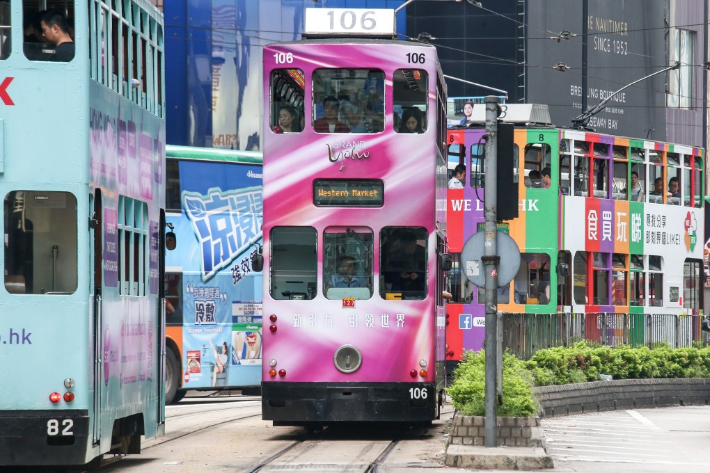 Trams on Hennessy Road, Causeway Bay. A cheap and reliable means of transport, they ply a 13km route along the north shore of Hong Kong Island. Photo: David Wong
