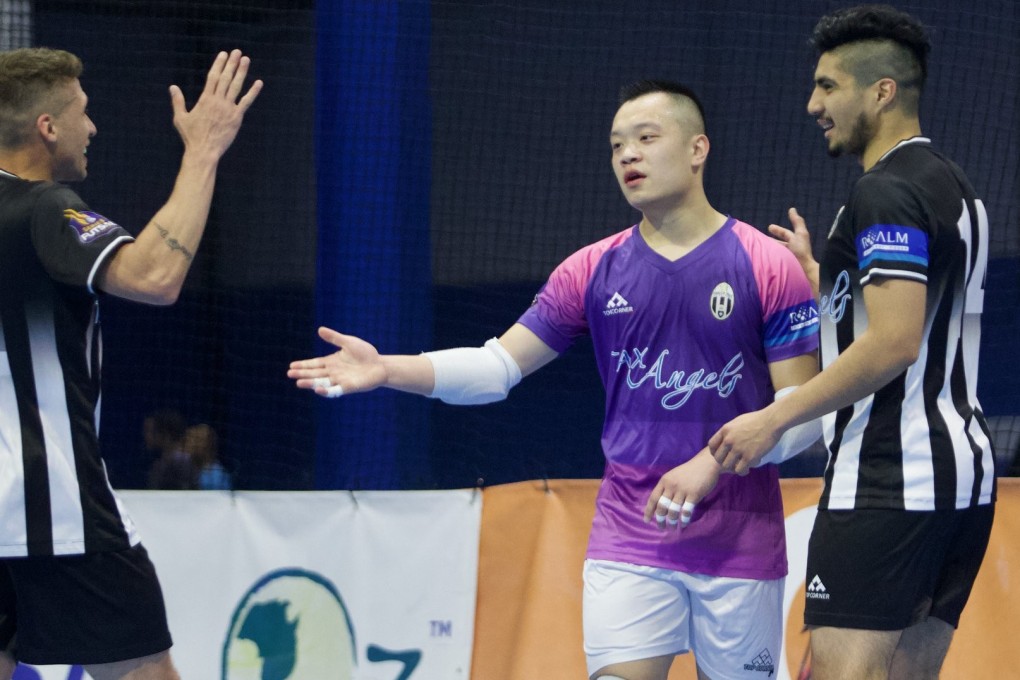 Aaron Yu celebrates scoring with his Melbourne Lions teammates. Photos: Handout
