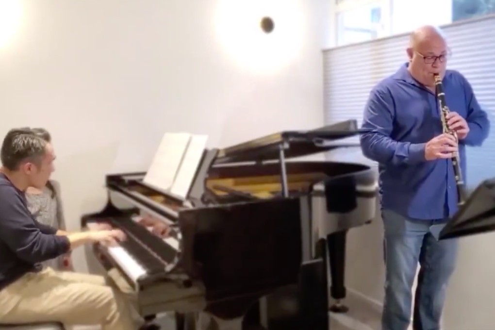 Hong Kong Philharmonic principal clarinettist Andrew Simon and pianist Warren Lee in a still from a video of them playing Joseph Horovitz's Sonatina. It’s the second video Simon has made for posting online to reach orchestra fans amid the coronavirus epidemic that’s shut concert halls. Photo: Hong Kong Philharmonic Orchestra