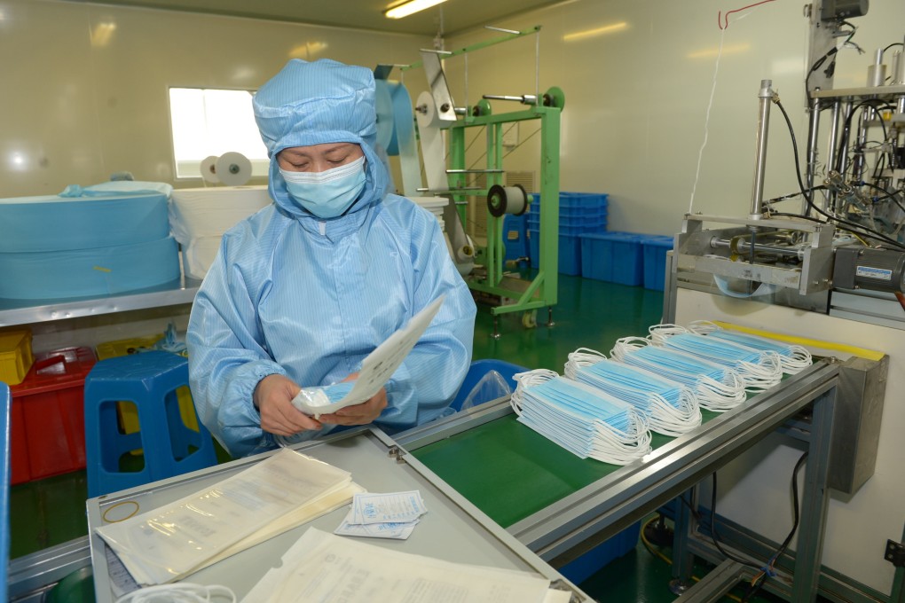 As of Saturday, China’s daily output of masks, including surgical masks and medical N95 masks, was 116 million units, or 12 times the output at the start of February, the country’s top economic planning agency said on Monday. Photo: Xinhua