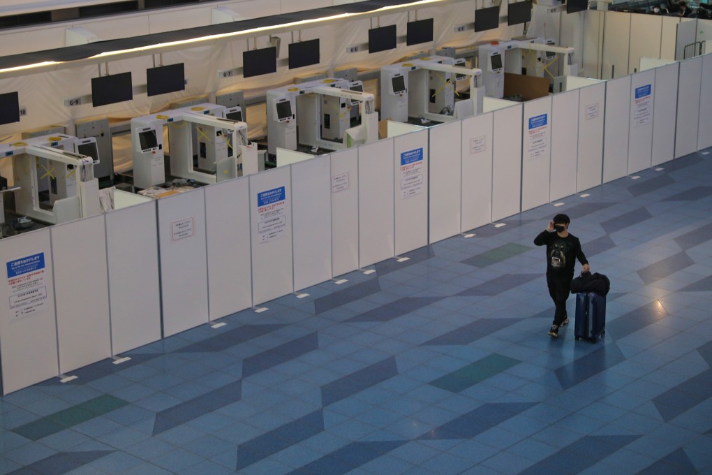 The virus is battering the airline industry with airports such as Haneda in Tokyo suffering drops in passenger numbers. Photo: Reuters