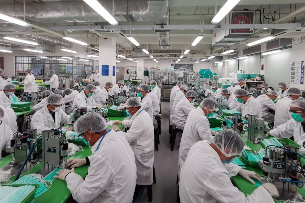 Volunteer officers from the Correctional Services Department produce masks at Lo Wu Correctional Institution on February 07, 2020. Photo: Handout