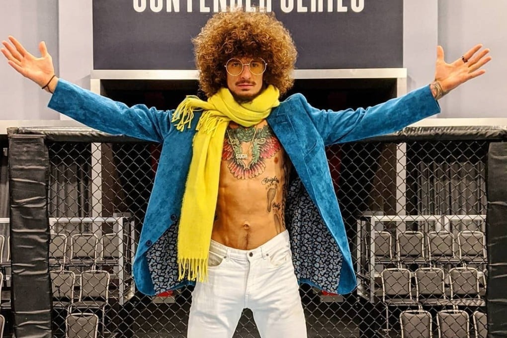 Sean O’Malley poses in the Dana White’s Contender Series cage in Las Vegas.