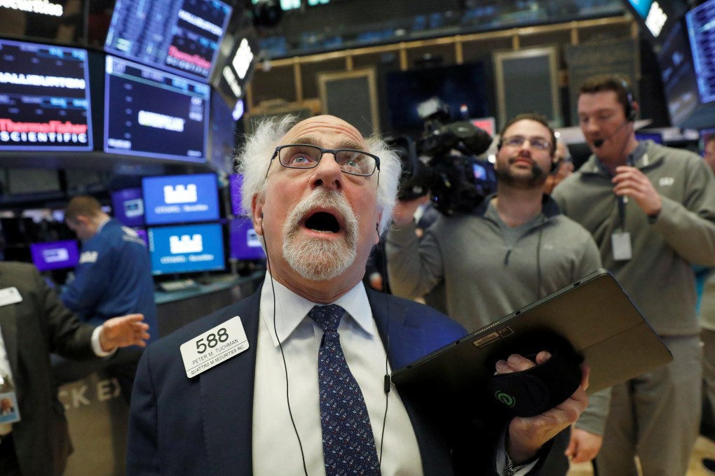 A trader works on the trading floor at the New York Stock Exchange on March 5, 2020, when stocks took a big tumble. Photo: Reuters