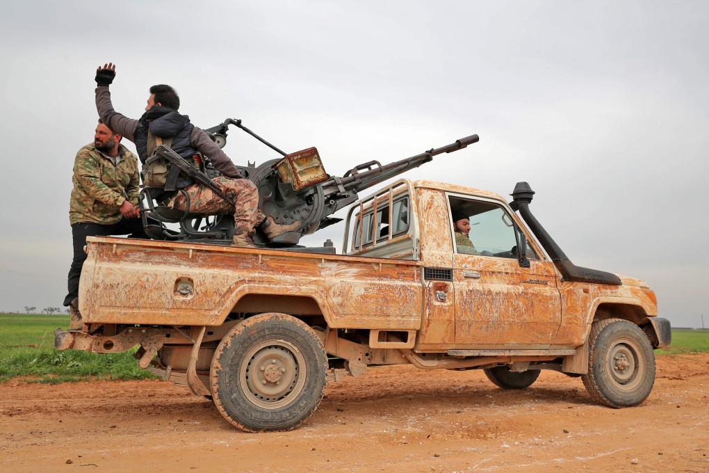 Turkish-backed Syrian rebels near the town Taftanaz in northeastern Idlib province. Photo: AFP