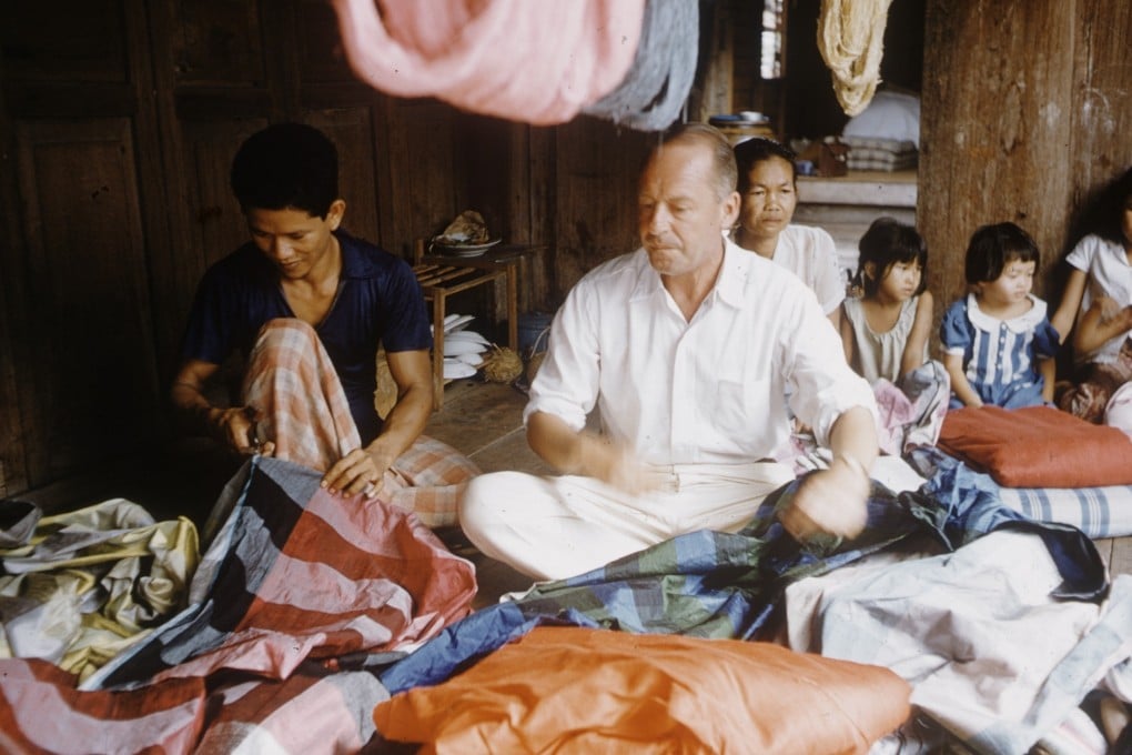 American businessman Jim Thompson pictured with some of Baan Krua’s silk weavers in 1955. Photo: Getty Images