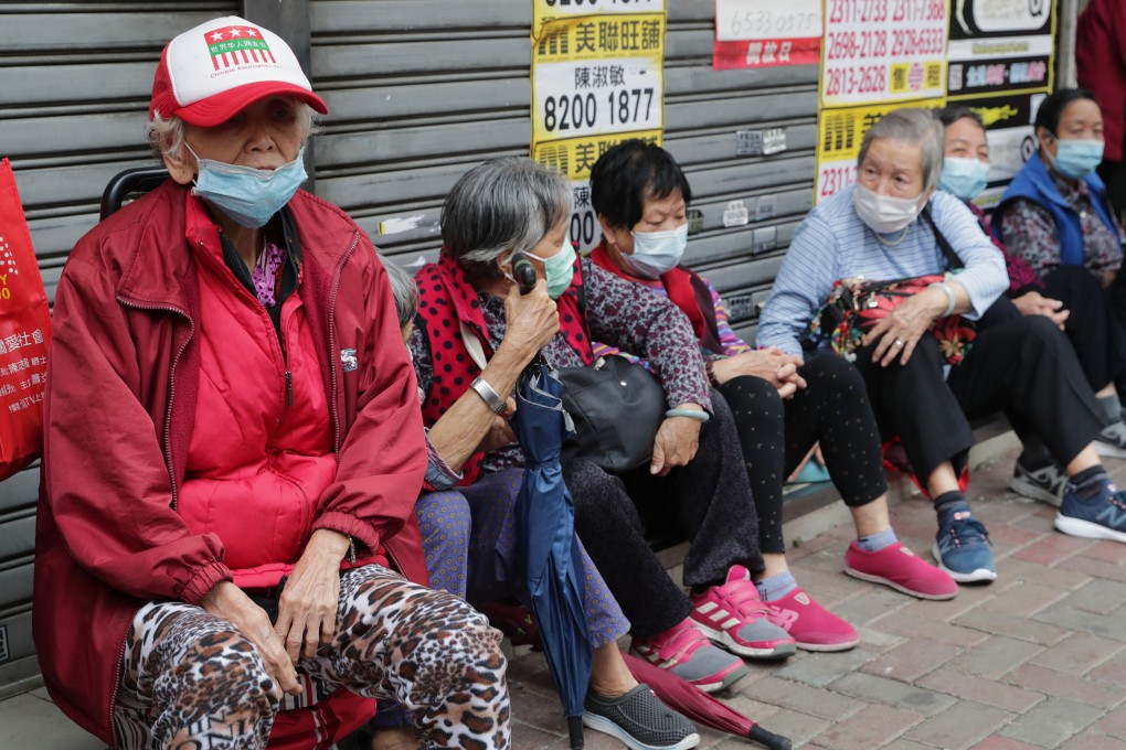 Elderly Hongkongers queue for free surgical masks in Sham Shui Po on February 14. Photo: Edmond So