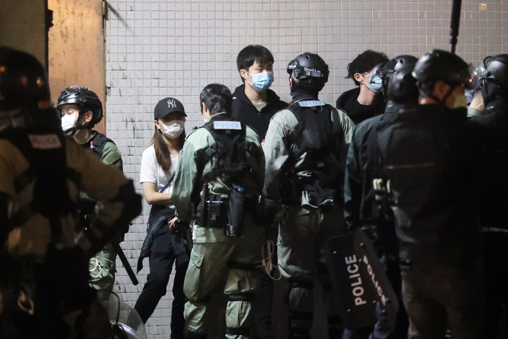 Police started searching protesters from about 8pm. Photo: Edmond So