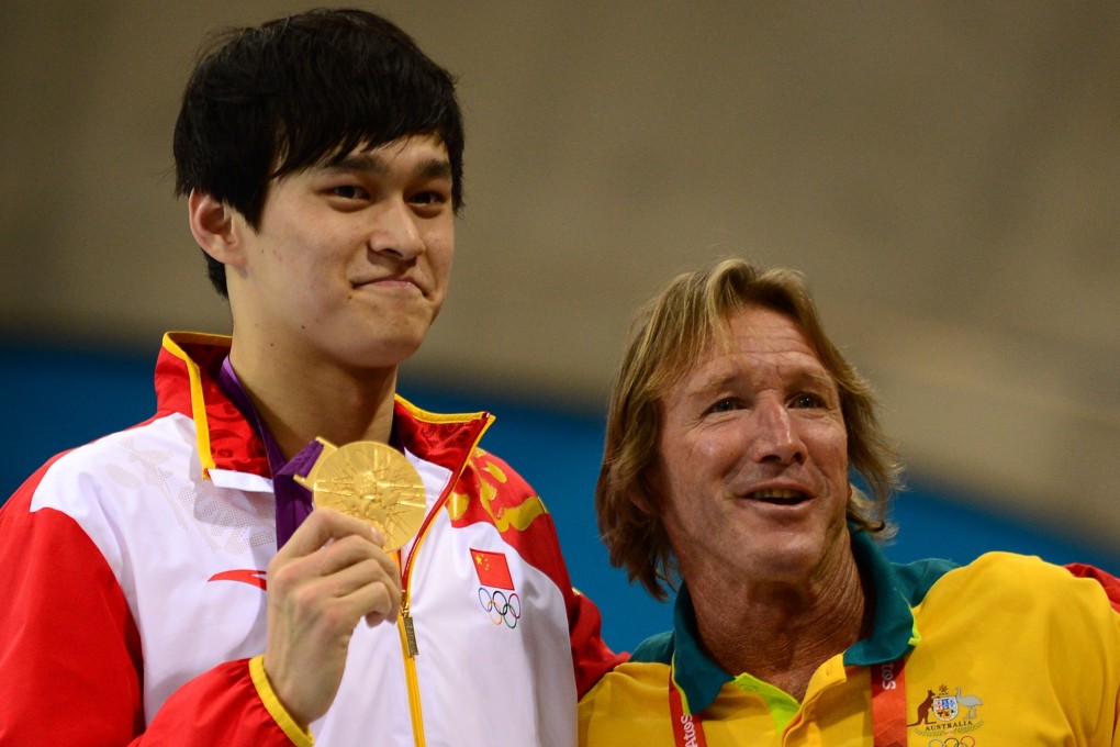 China’s Sun Yang with Australian coach Denis Cotterell after winning the men’s 1,500m freestyle final at the London 2012 Olympics. Photo: AFP