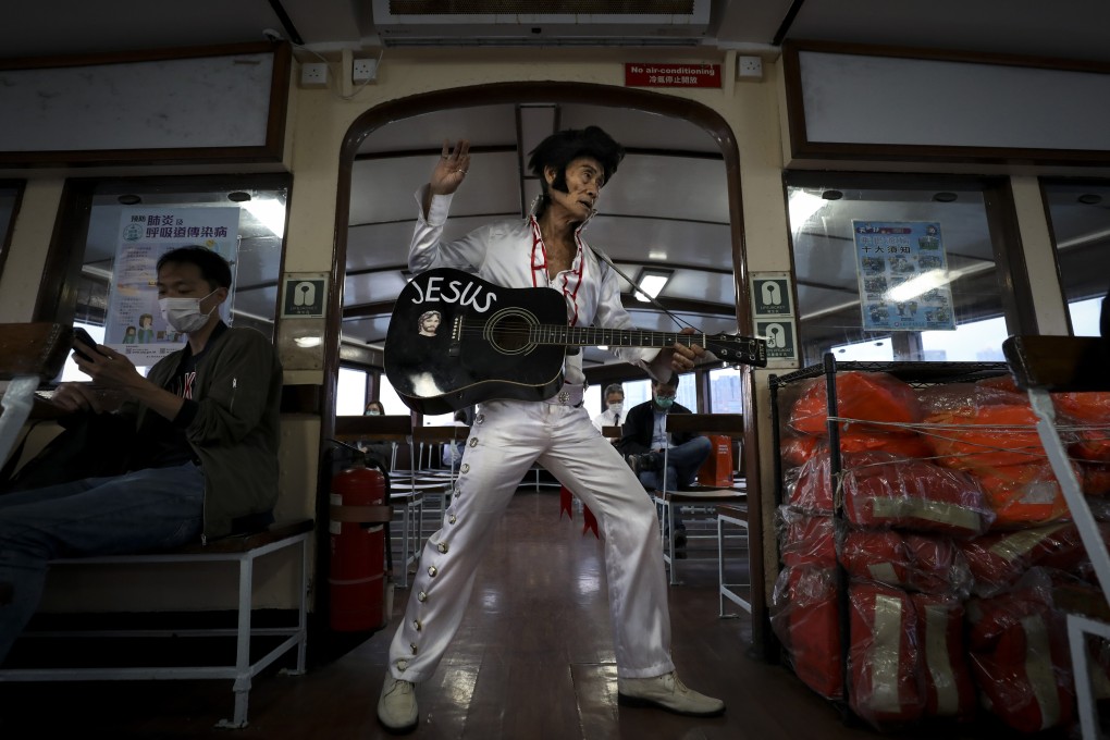 Elvis Presley impersonator Melvis on the ferry to Wan Chai, Hong Kong. Born Kwok Lam-sang in Indonesia, he has been performing Presley songs in Hong Kong Island bars for nearly 30 years. Photo: James Wendlinger