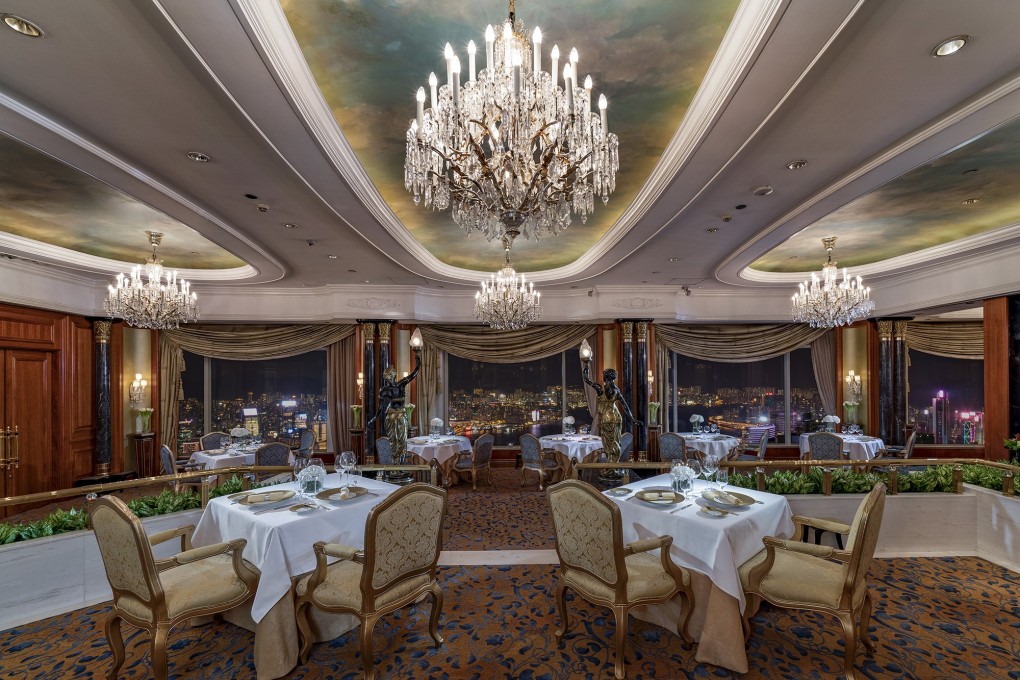 Chandeliers, marble columns and ornate cornices at Restaurant Petrus. Photos; handouts