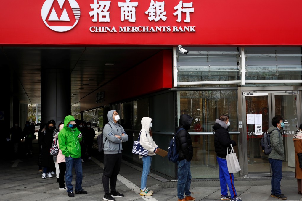 Chinese banks extended 905.7 billion yuan (US$130 billion) in new yuan loans in February, down from a record 3.34 trillion yuan (US$480 billion) in January and missing analyst expectations, according to data released by the People’s Bank of China (PBOC) on Wednesday. Photo: Reuters