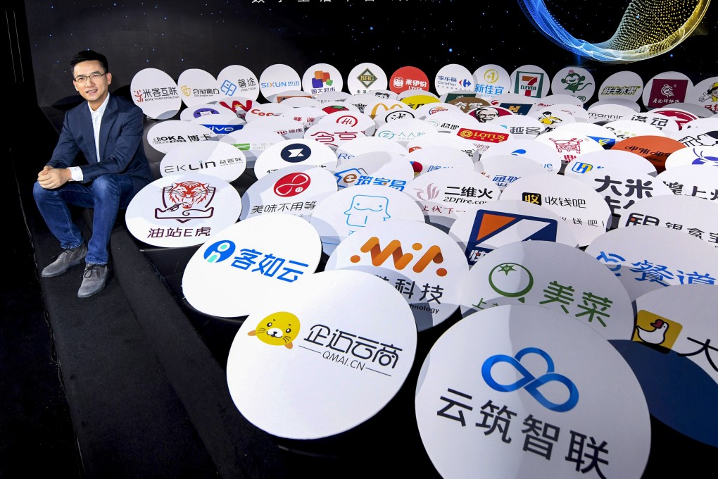 Simon Hu, chief executive of Ant Financial Services, unveils the three-year plan to open up the Alipay platform at the Alipay Partner Conference held in Hangzhou, Zhejiang province, on March 10. Photo: Handout