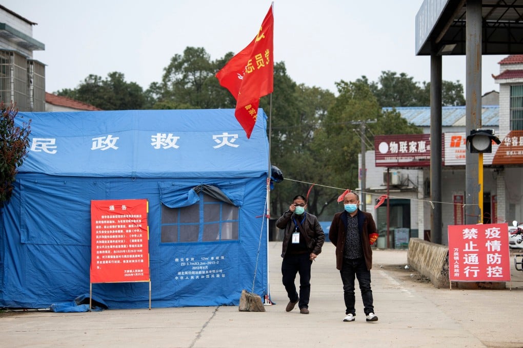 Restrictions on people’s movements in Hubei province are gradually being lifted, but the joy was short-lived in Qianjiang. Photo: AFP