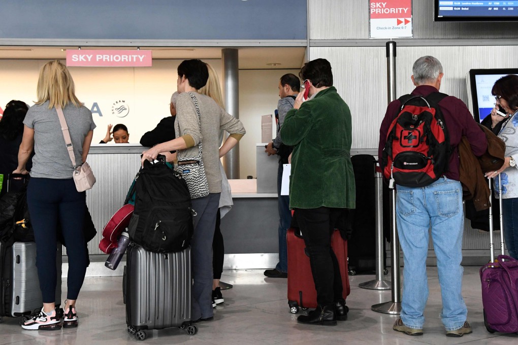Travellers at Paris-Charles de Gaulle airport. Photo: AFP