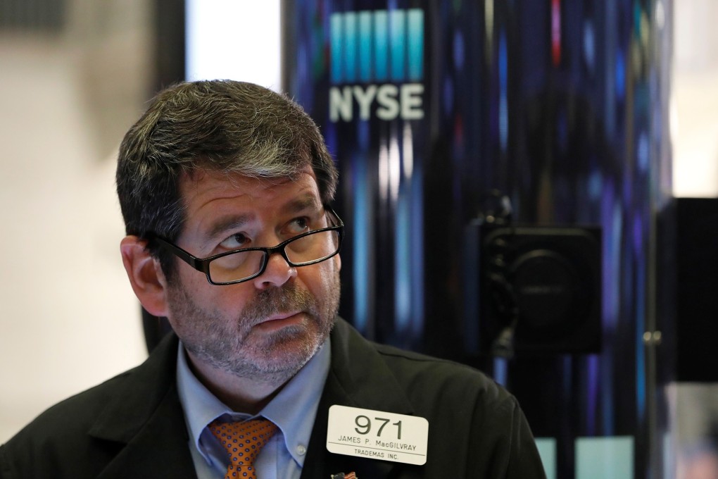 A trader works on the floor of the New York Stock Exchange on Wednesday. Photo: Reuters