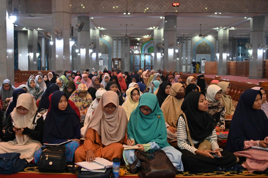 Indonesian women attending a religious lecture on marriage without dating at a mosque in Bekasi, on the eastern border of the capital Jakarta. Photo: AFP