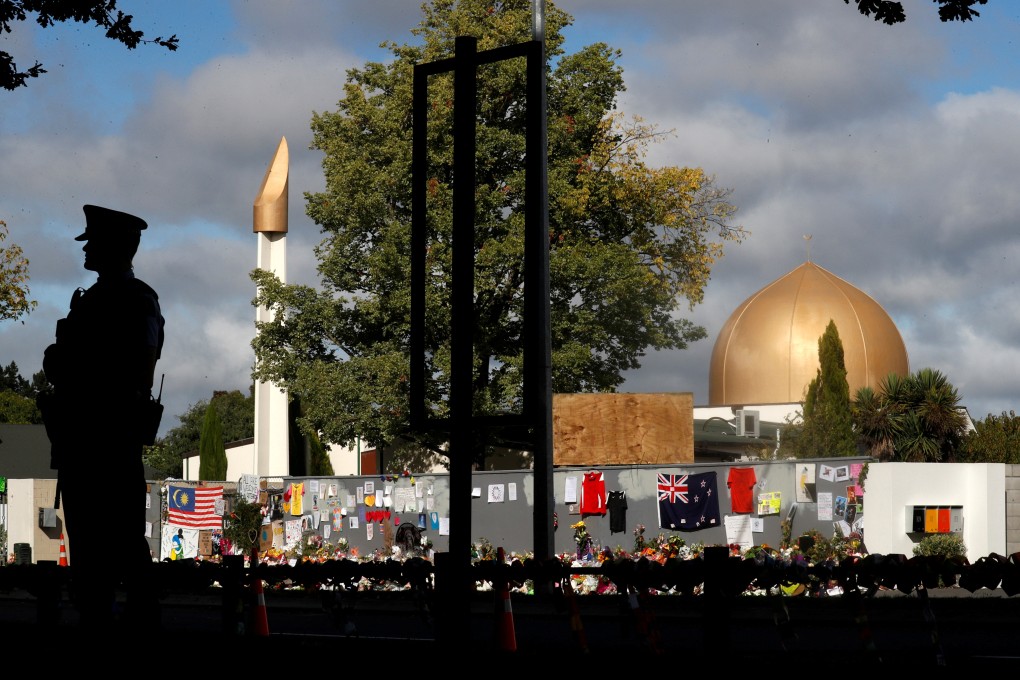 A police officer stands guard outside the Al Noor mosque in Christchurch in March 2019. Photo: Reuters