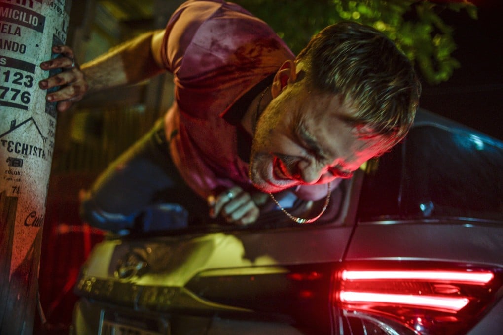 Peter Lanzani in a still from 4x4 (category IIB; Spanish), directed by Mariano Cohn and co-starring Dady Brieva.