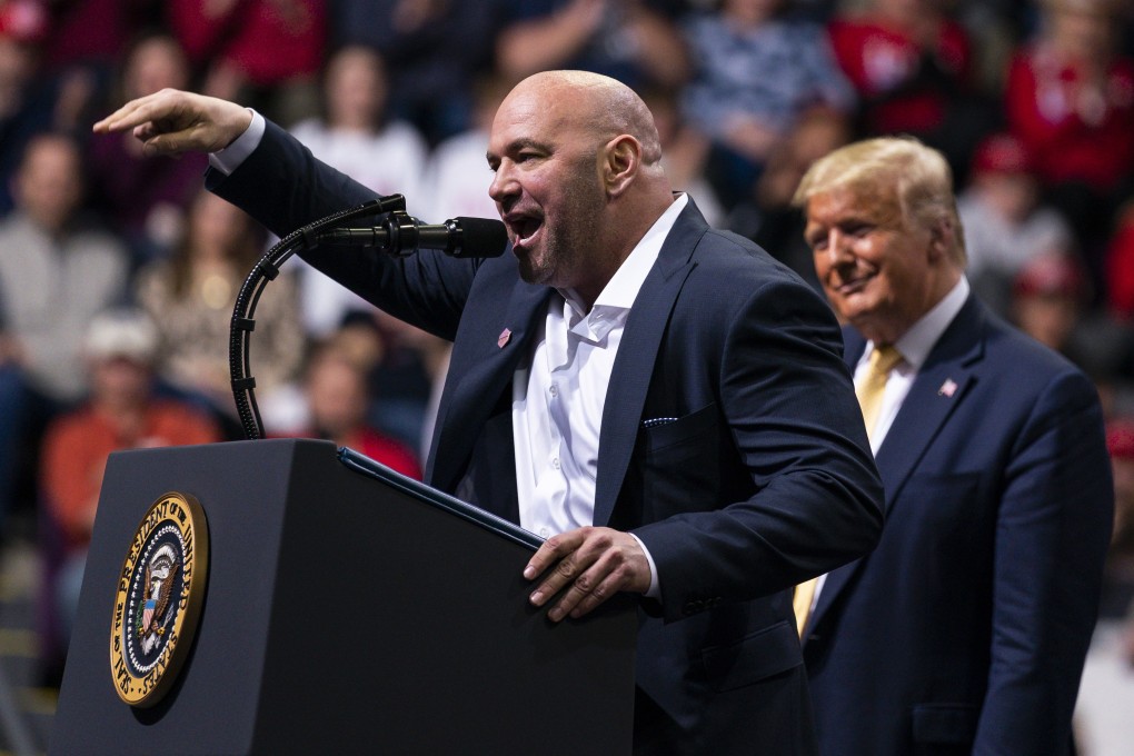 US president Donald Trump looks on as UFC president Dana White speaks during a campaign rally at the Broadmoor World Arena in Colorado Springs. Photos: AP