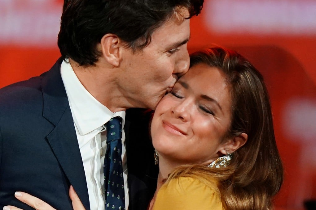 Canadian Prime Minister Justin Trudeau and his wife, Sophie, hug on stage after the federal election in Montreal in October. Photo: Reuters