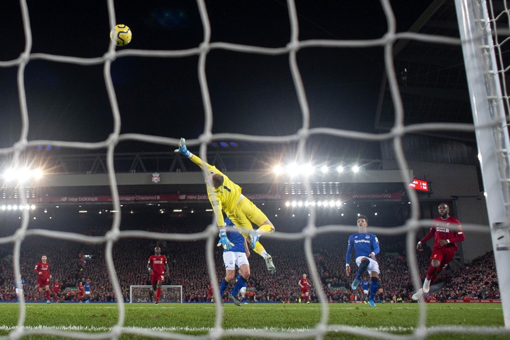 Liverpool’s focus switches to the Premier League again as they face Everton at Goodison Park on Monday night. Photo: EPA