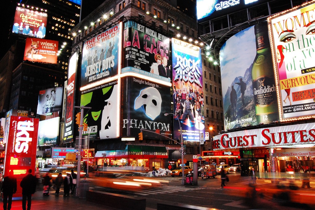 Broadway theatre ads light up Times Square in Manhattan during happier times. New York Governor Andrew Cuomo banned public gatherings of 500 or more people in the state on Thursday to help limit the spread of the coronavirus. Photo: Shutterstock