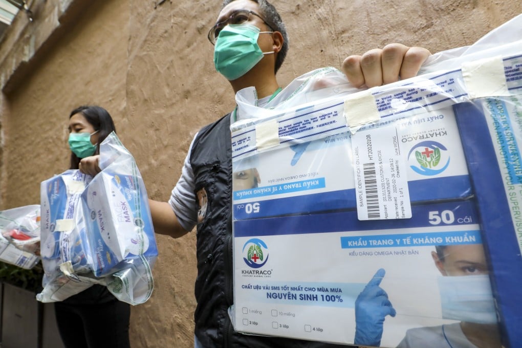 Customs officers on Saturday arrested four people from pharmacies in Wan Chai and Causeway Bay for selling masks with dangerous levels of bacterial count. Photo: Dickson Lee