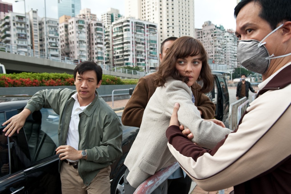 Marion Cotillard (centre) in a scene from Contagion (2011). Makers of the film have explained how they saw an outbreak like coronavirus coming. Photo: Claudette Barius