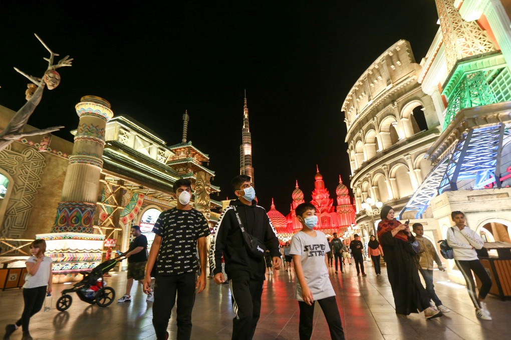 Visitors to Global Village in Dubai, United Arab Emirates, wear protective face masks following the coronavirus outbreak. Photo: Reuters