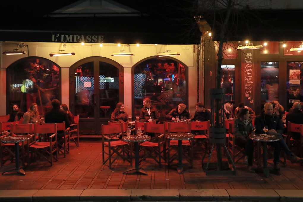People gather at a cafe terrace in Le Touquet. Photo: AFP