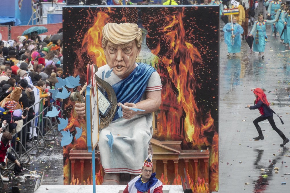 A figure depicting US President Donald Trump as Emperor Nero “fiddling while Rome burns” is displayed in a traditional carnival parade in Mainz, Germany. Photo: AP